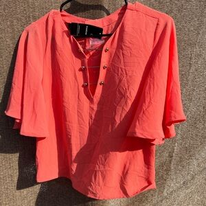 coral bebe blouse with bell sleeves and gold-tone pin NWT